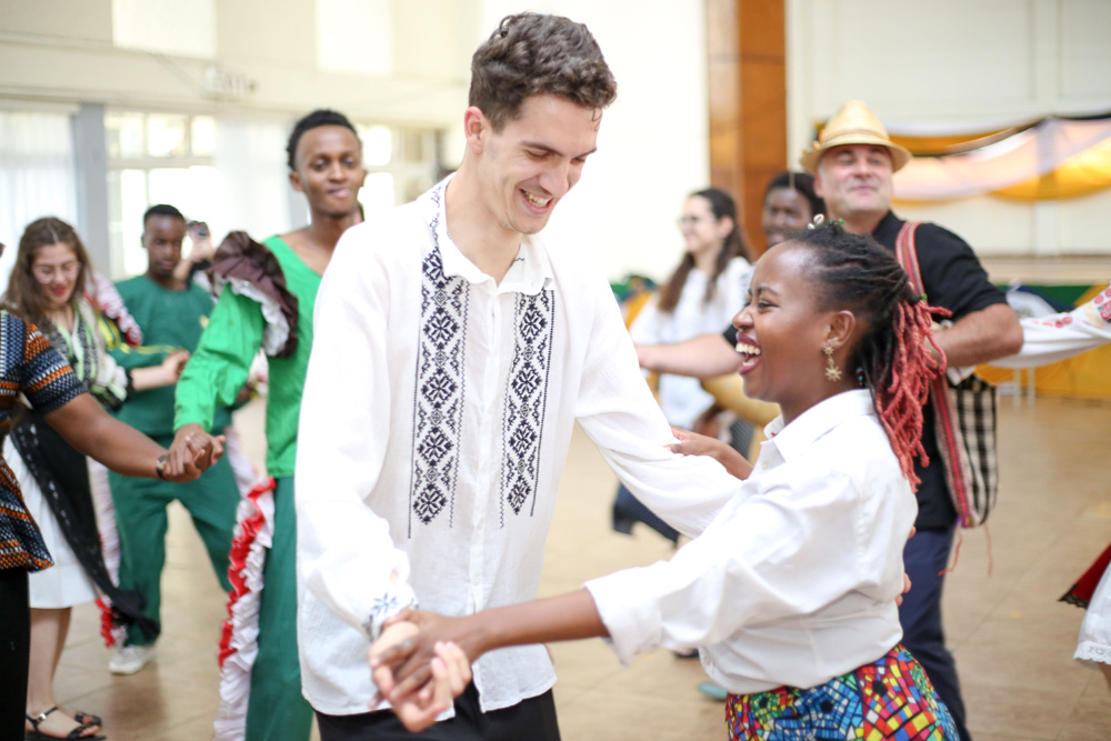Students and lecturers from TU-K and Universities in Romania join in a dance exhibiting cultural heritage and traditions from Kenya and Romania during the \u2018World Day for Cultural Diversity for Dialogue and Development\u2019 which was held at the TU-K\u2019s Main Hall.