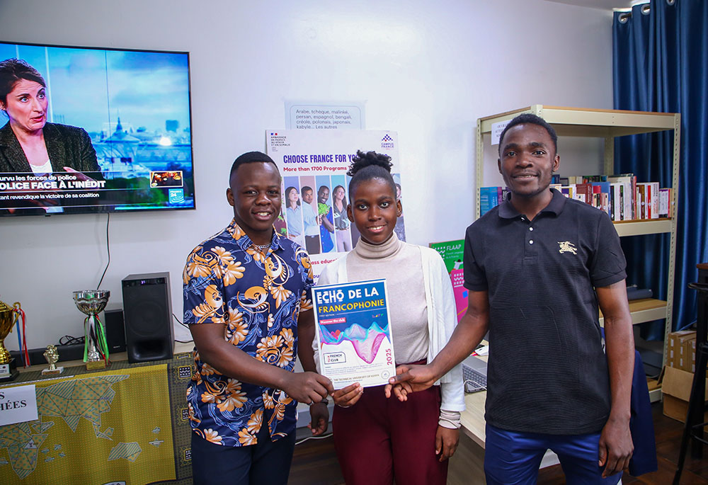 The Technical University of Kenya French Club President Obren Lourmex(left) with two of the club members. The club has launched the first ever French magazine by a Kenyan university called \u2018\u00c9cho de la Francophonie\u2019.