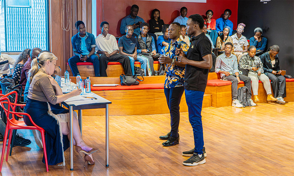TU-K students Hopekings Musinya and Obren Lourmex making a presentation on 'How Artificial Intelligence is Reshaping Education' during the contest at Alliance Fran\u00e7aise