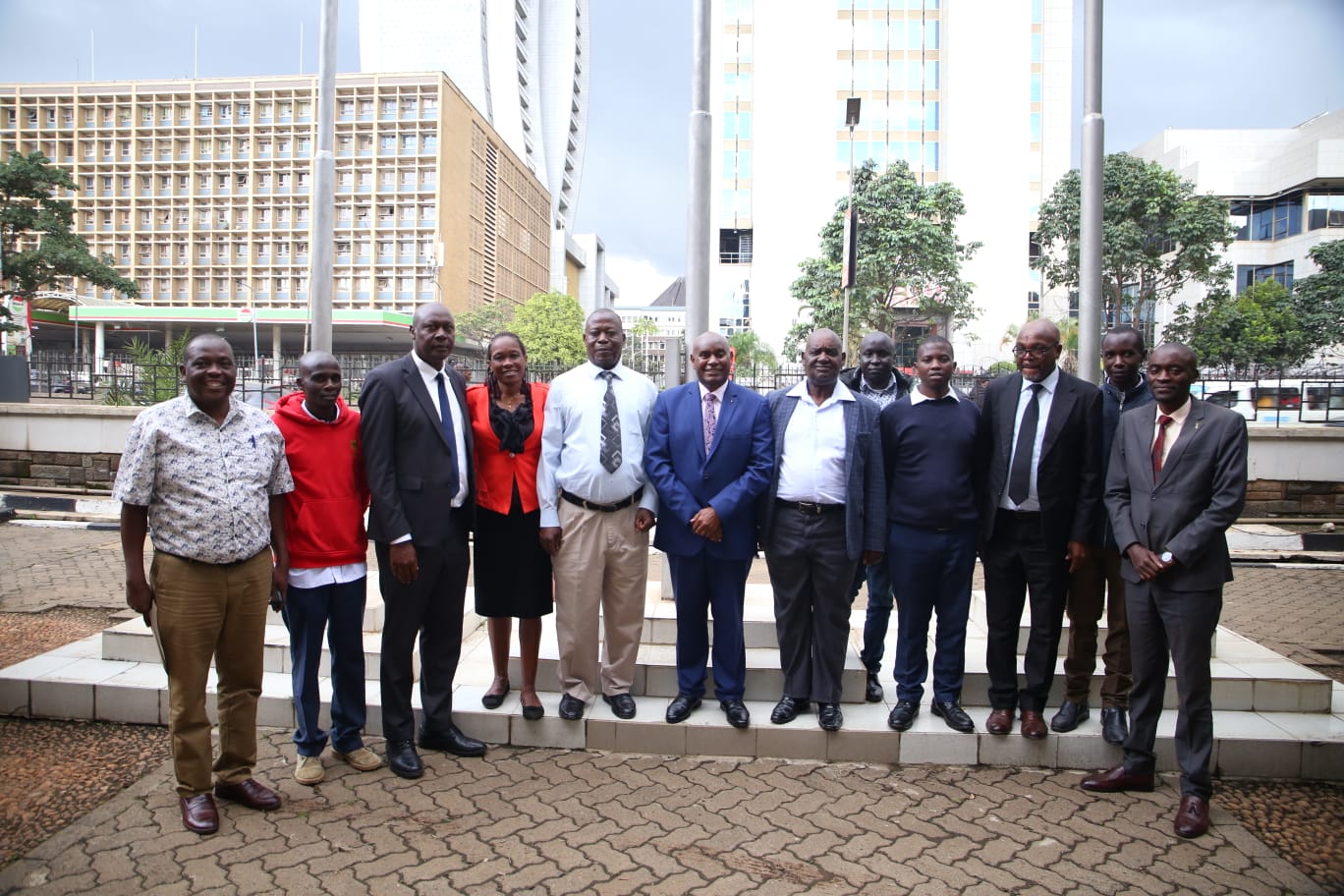 Representatives from Masinde Muliro University of Science and Technology and The Technical University of Kenya pose for a group photo during a benchmarking visit at TU-K, where the MMUST delegation explored the Un.pdf